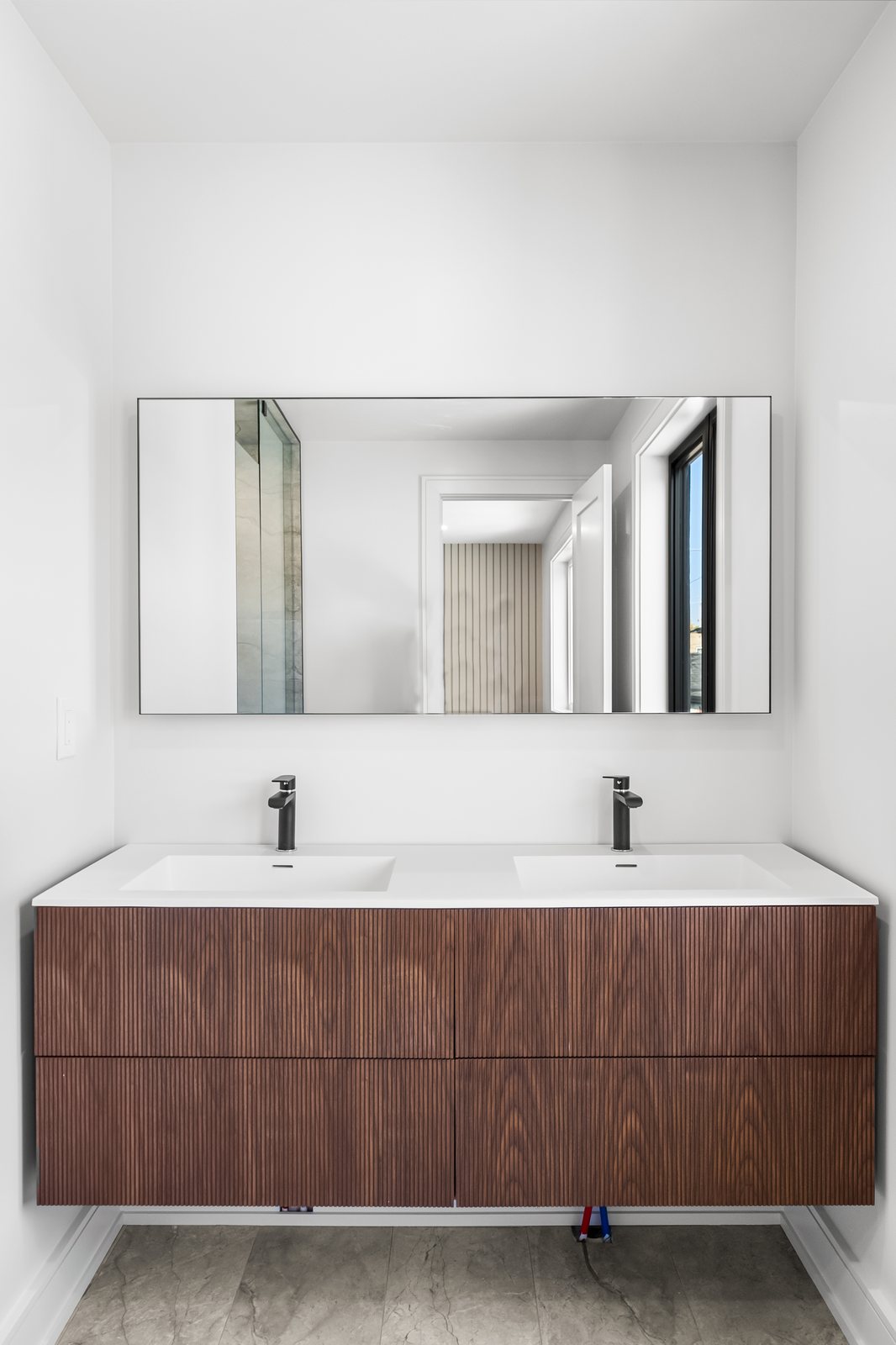 Modern multiplex exterior with premium finishes developed by Reside Properties in Toronto
